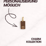 Eleganter Aurelia CHARM als Geschenk für Frauen mit goldfarbiger Öse und Herzmotiv.
