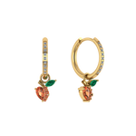 Pavé-Creole mit Pfirsich-Charm, vergoldet, detailreich funkelnd.