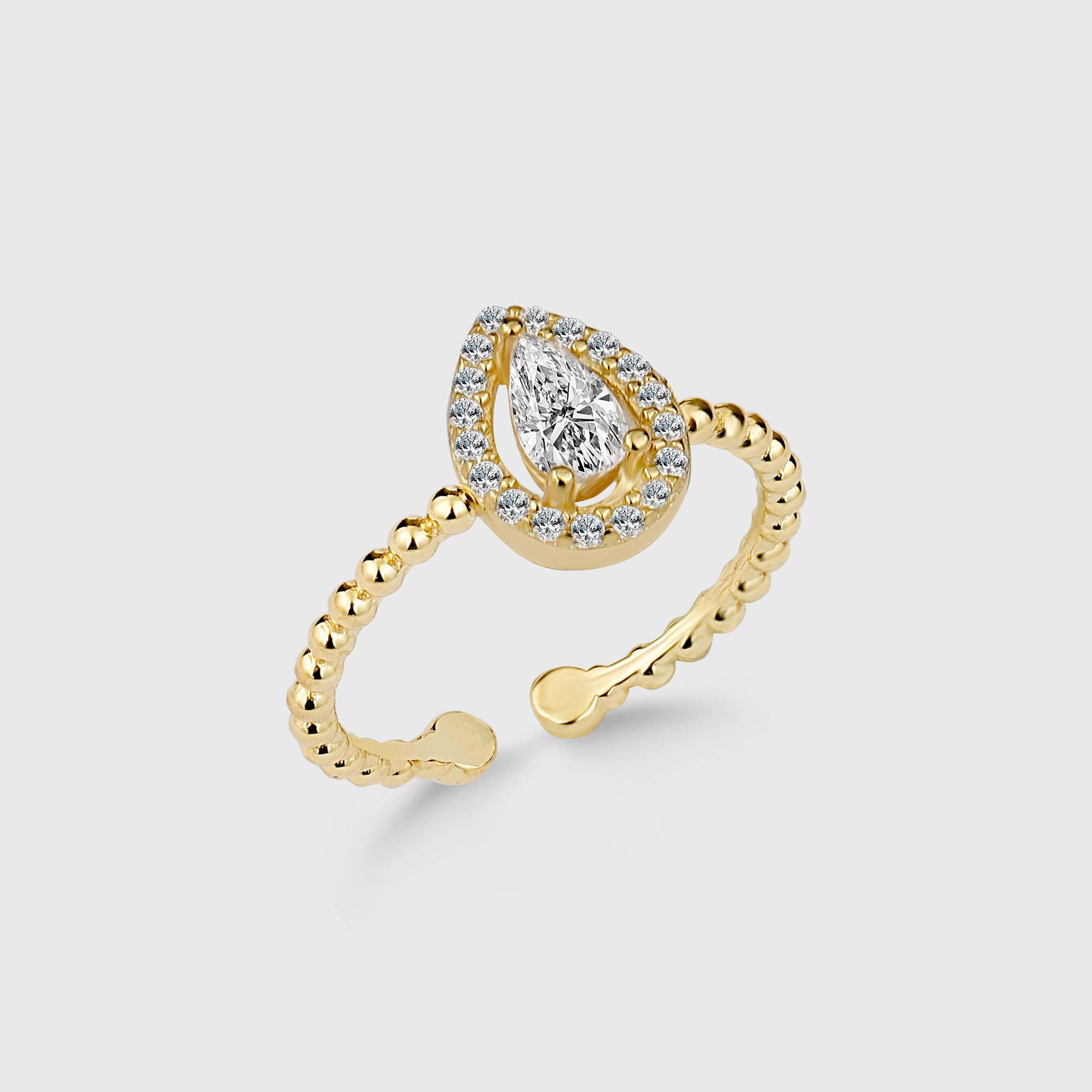 Goldener Drop Diamond Ring mit Zirkonia-Kranz, verstellbarer Damenring von Dkeniz auf hellem Hintergrund.
