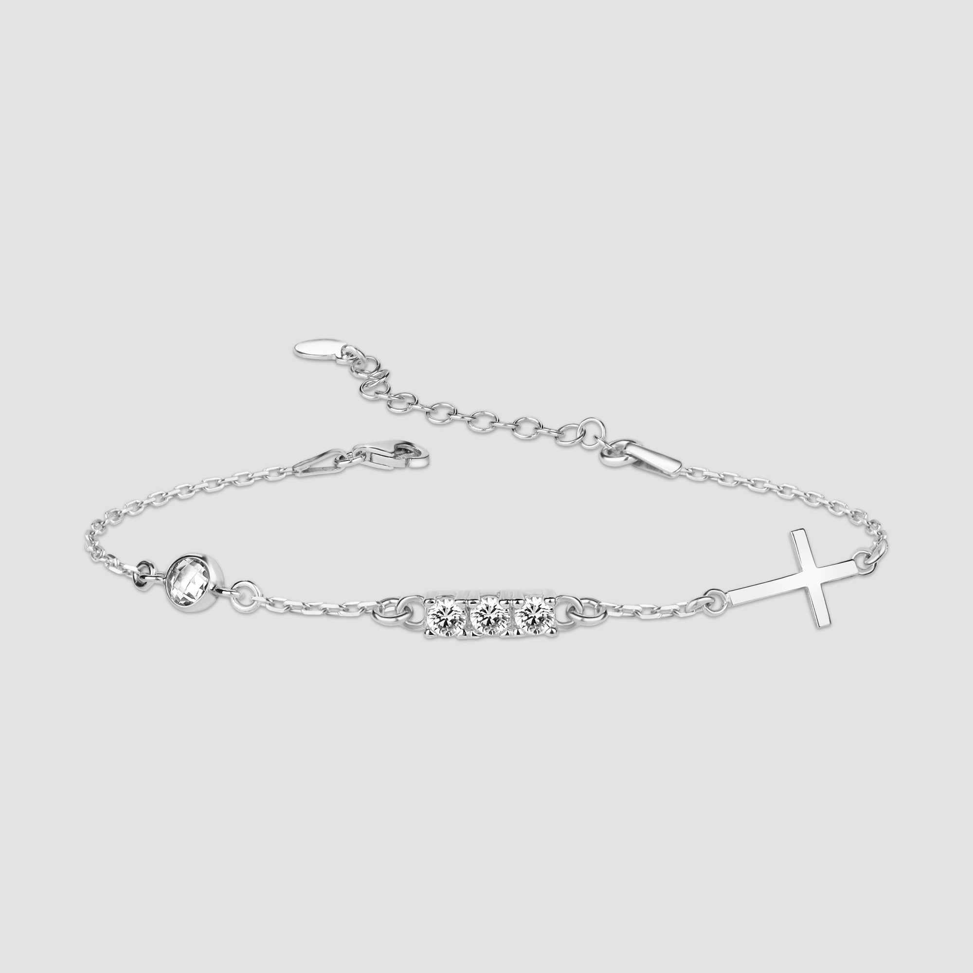 Element & Kreuz Armkette aus 925 Sterling Silber, rhodiniert, mit Zirkonia – Produktfoto auf grauem Hintergrund.