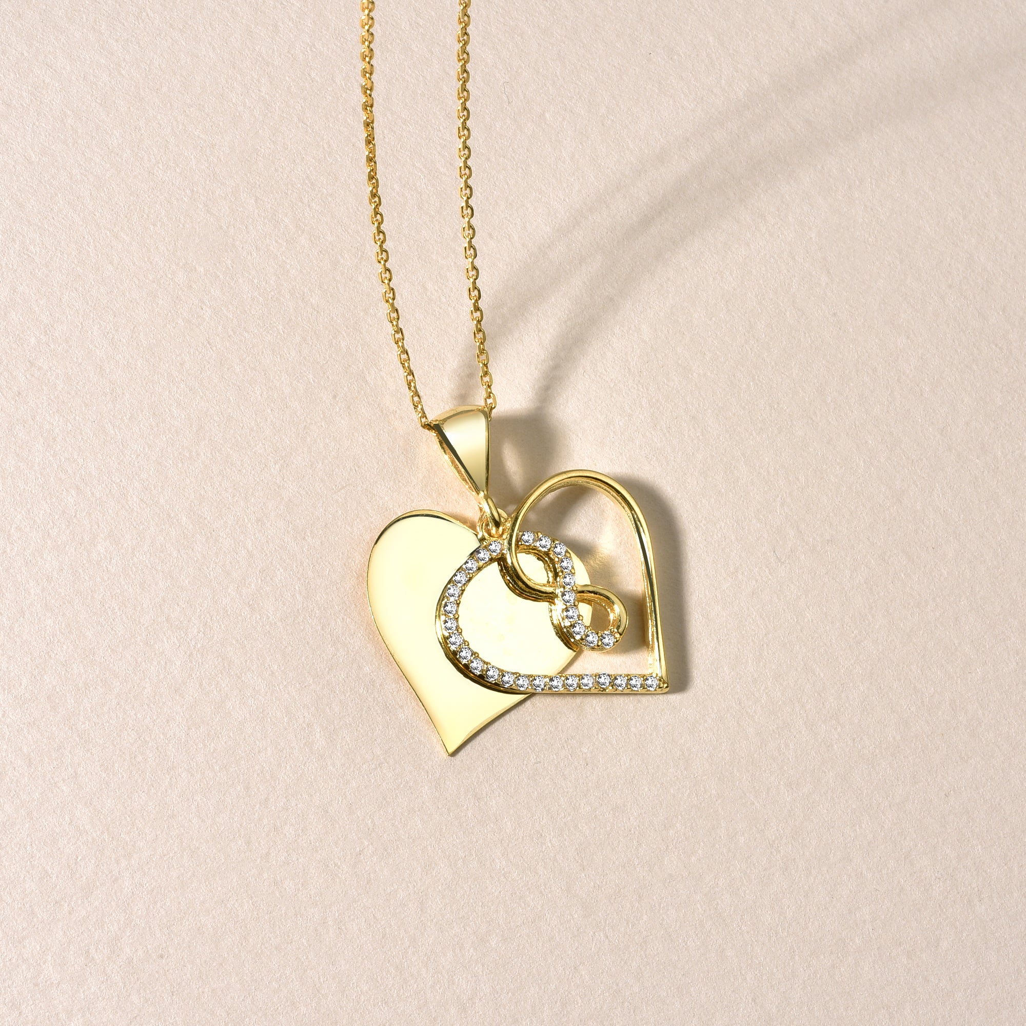 Goldene Infinity Love Kette mit Herzanhänger für Damen