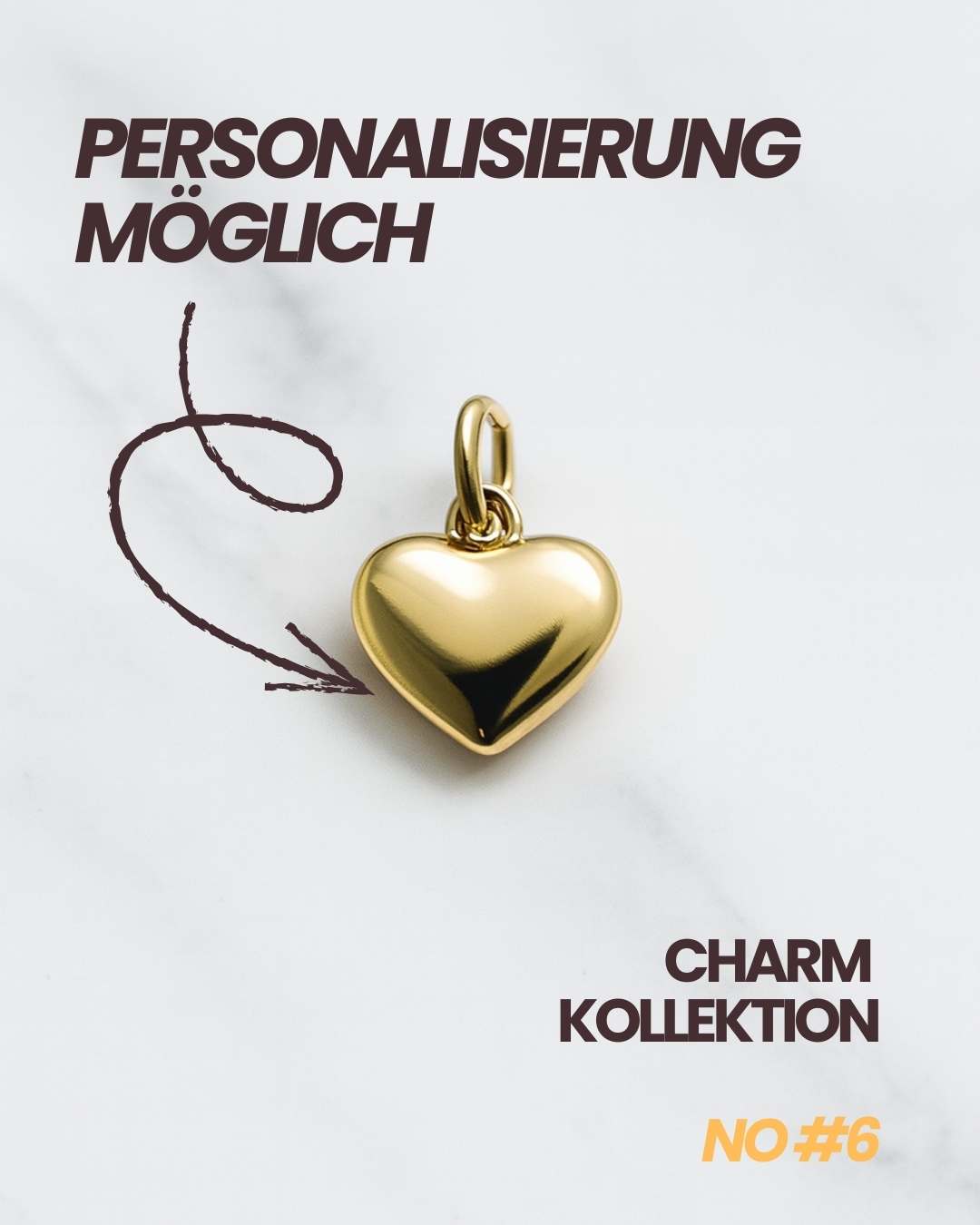 Detailaufnahme eines goldenen Herz Charms der Lissabon Kollektion auf weißem Hintergrund