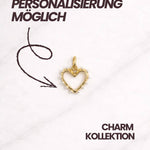Filigraner Herz-Charm in Gold mit Perlendetails für Armband oder Kette.