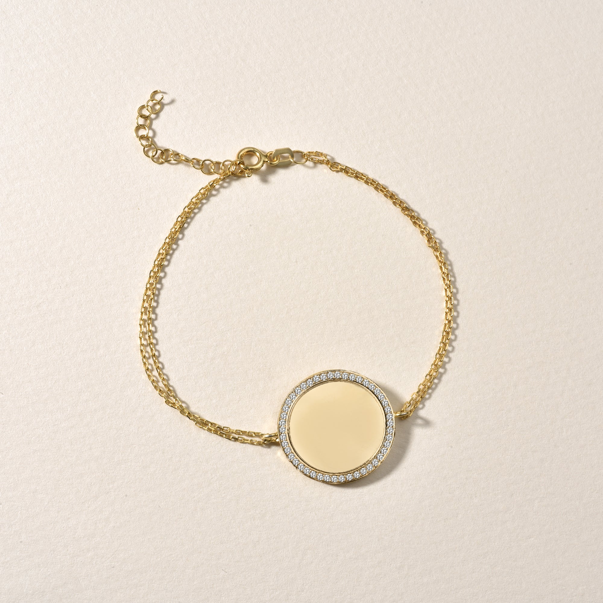 Mirror Gravur Armkette Gold flach fotografiert – 925 Silber vergoldet, Zirkonia Rahmen.