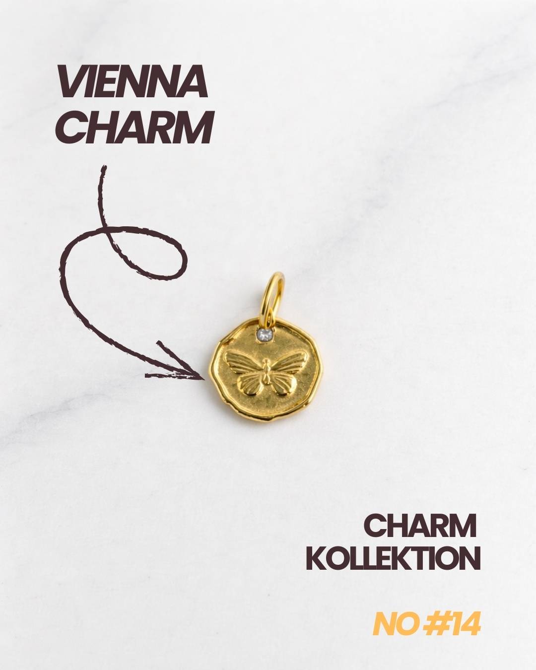 Goldener Vienna Charm (Butterfly Coin) als Teil der Charm Kollektion, Produktfoto freigestellt.