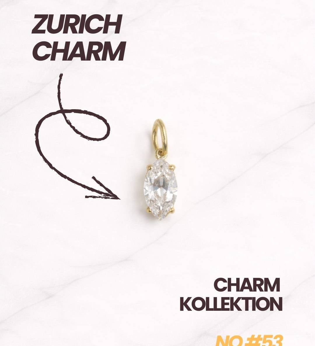Goldener Zurich CHARM aus der Charm Kollektion mit länglichem Zirkonia.