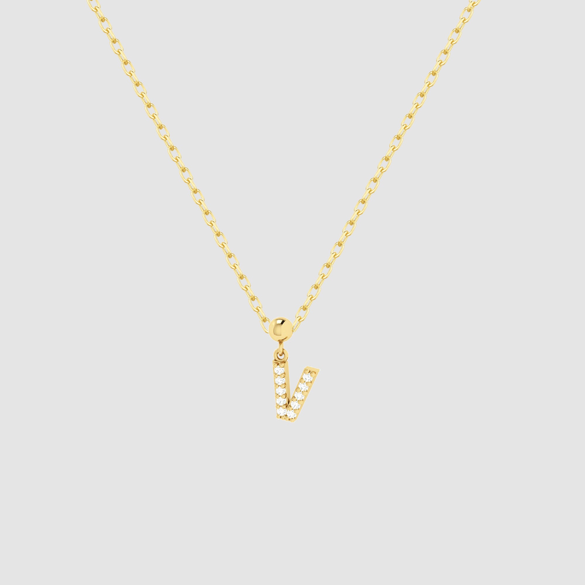 Feine goldene Halskette mit funkelndem Buchstaben V Zirkonia Anhänger von Dkeniz.