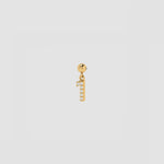 Goldener Charm Numbers Anhänger Zahl 1 mit weißen Zirkonia auf hellem Hintergrund.