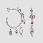 Silberne Creolen mit bunten Zirkonia und Symbol-Anhängern Auge, Hamsa und Flügel von Dkeniz.