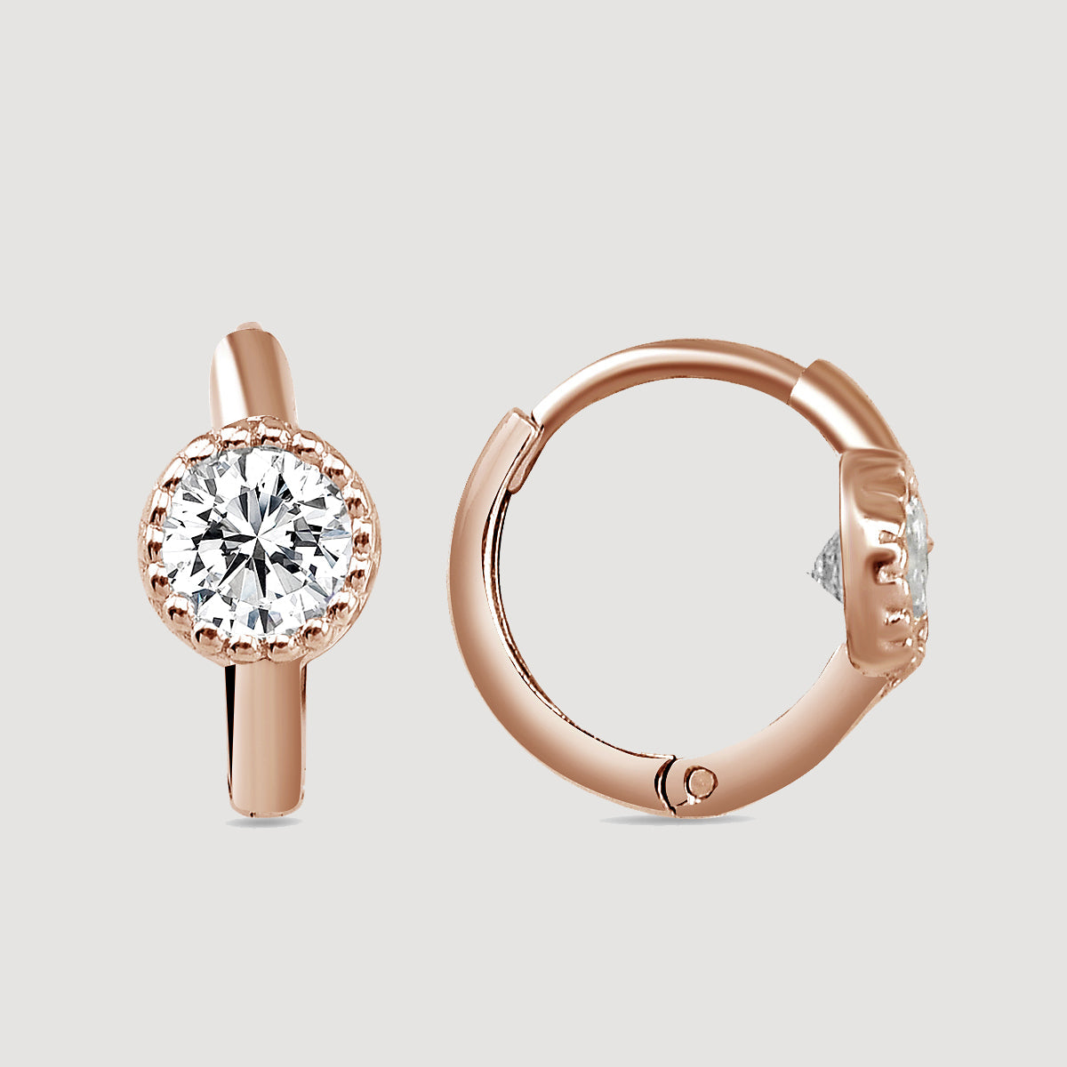 Creolen Zirkonia Classic in Roségold mit rundem Zirkonia-Stein auf hellem Hintergrund.
