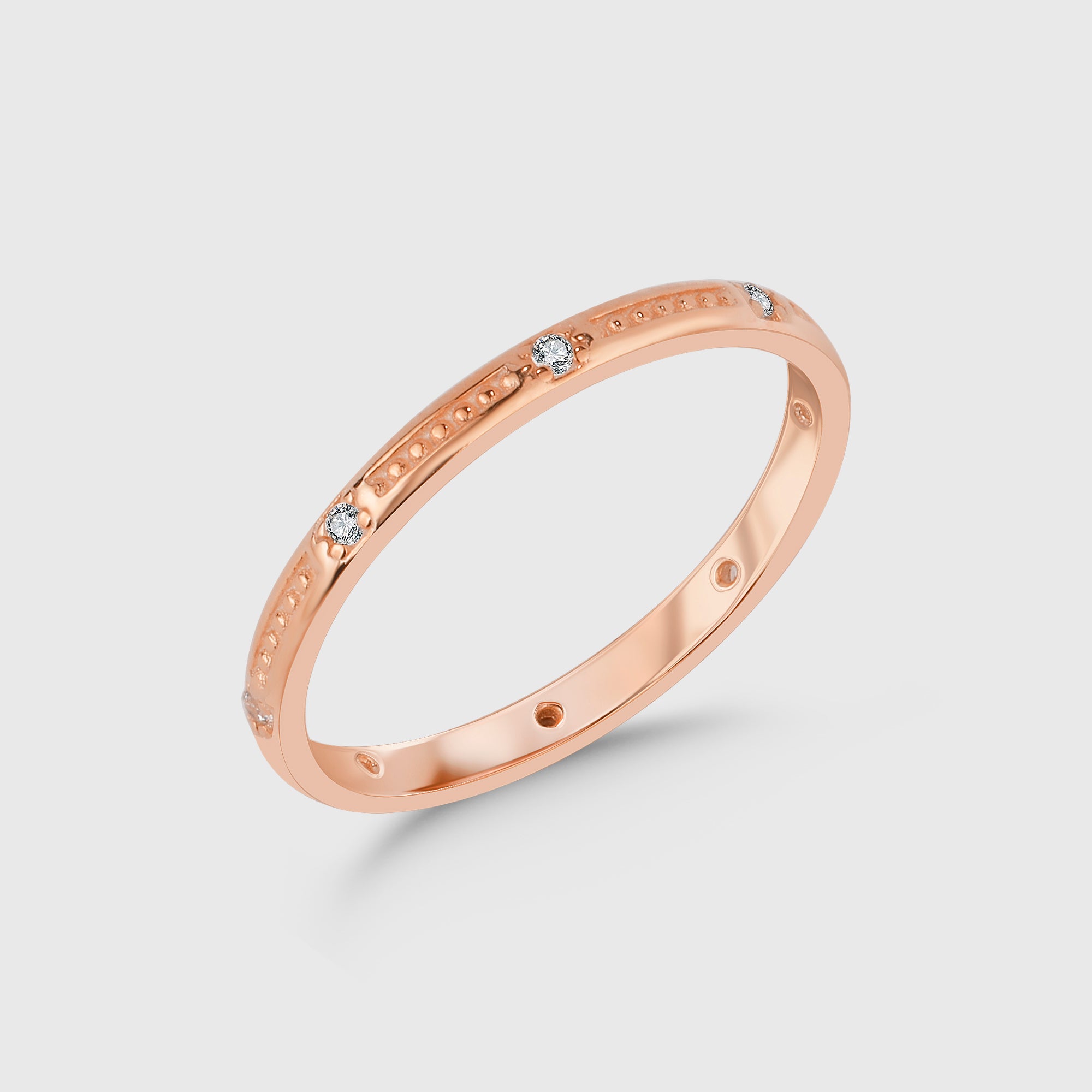 Crush Zirkonia Ring in Roségold, filigraner Damenring mit weißen Zirkonia-Steinen.