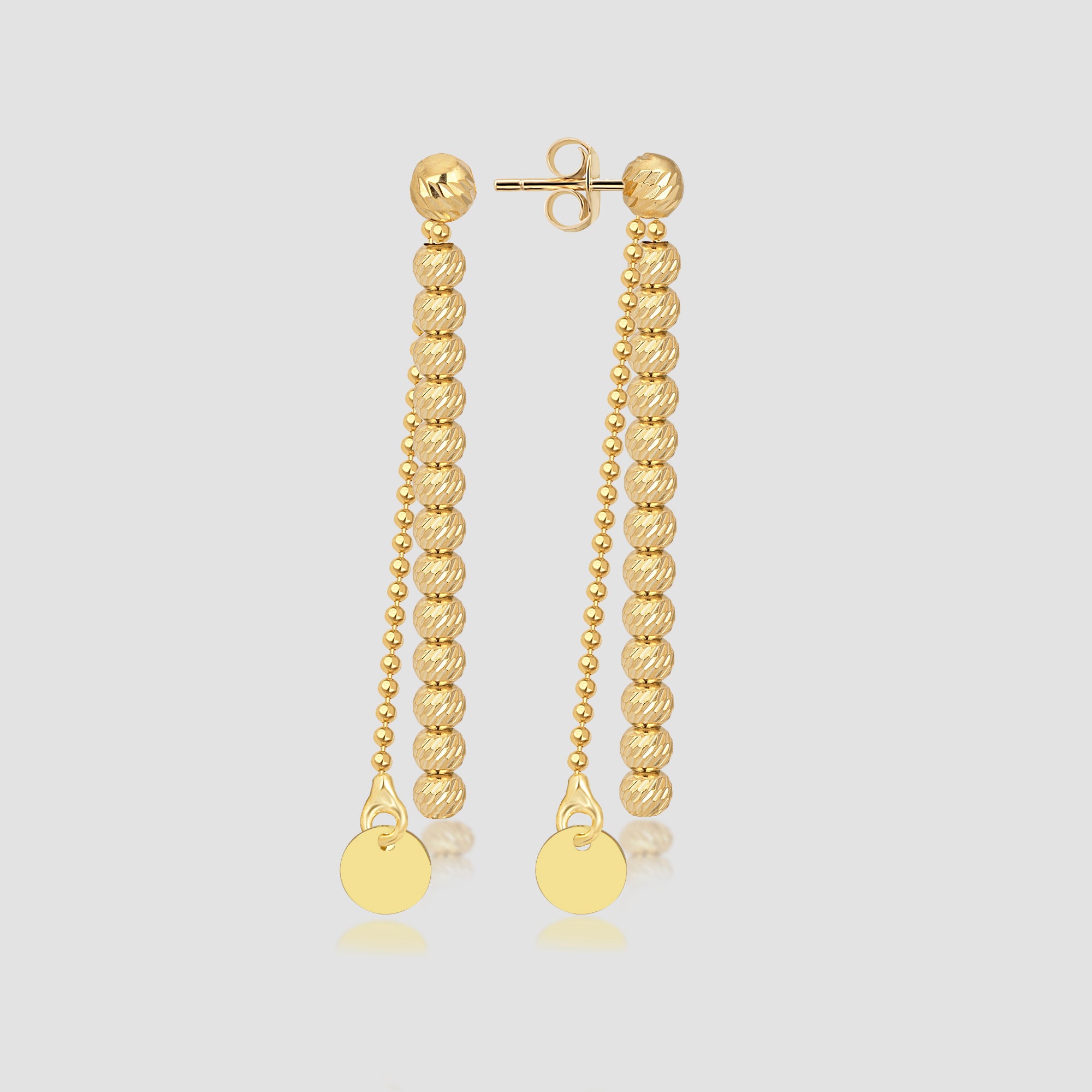 Freisteller: SHINY BALLS II Ohrringe Gold aus 925 Silber, 14K vergoldet, längliches Kugel-Design mit Plättchen.