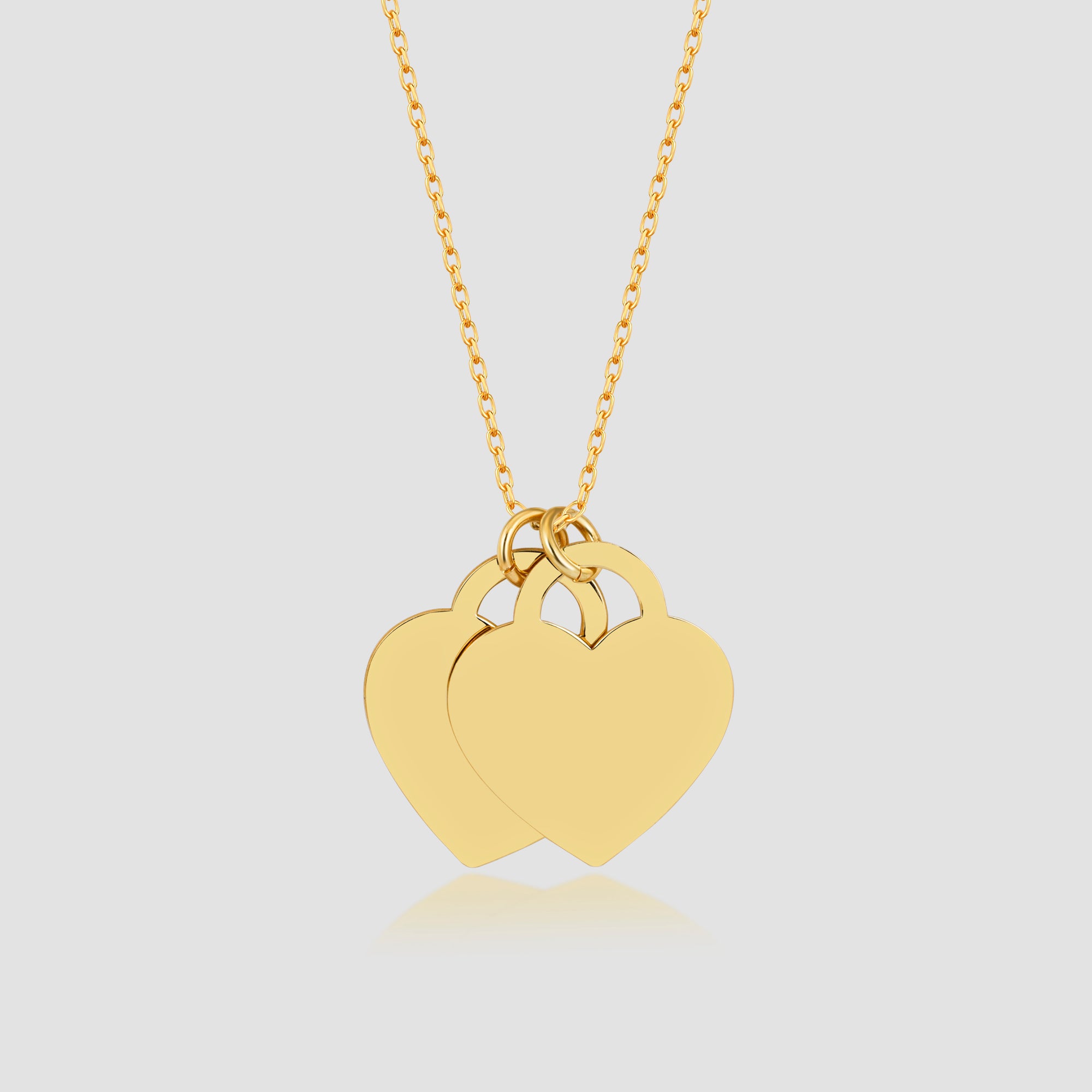 Double Heart Kette Gold mit zwei Herz-Anhängern aus 925 Silber, 14K vergoldet – freigestelltes Produktbild.