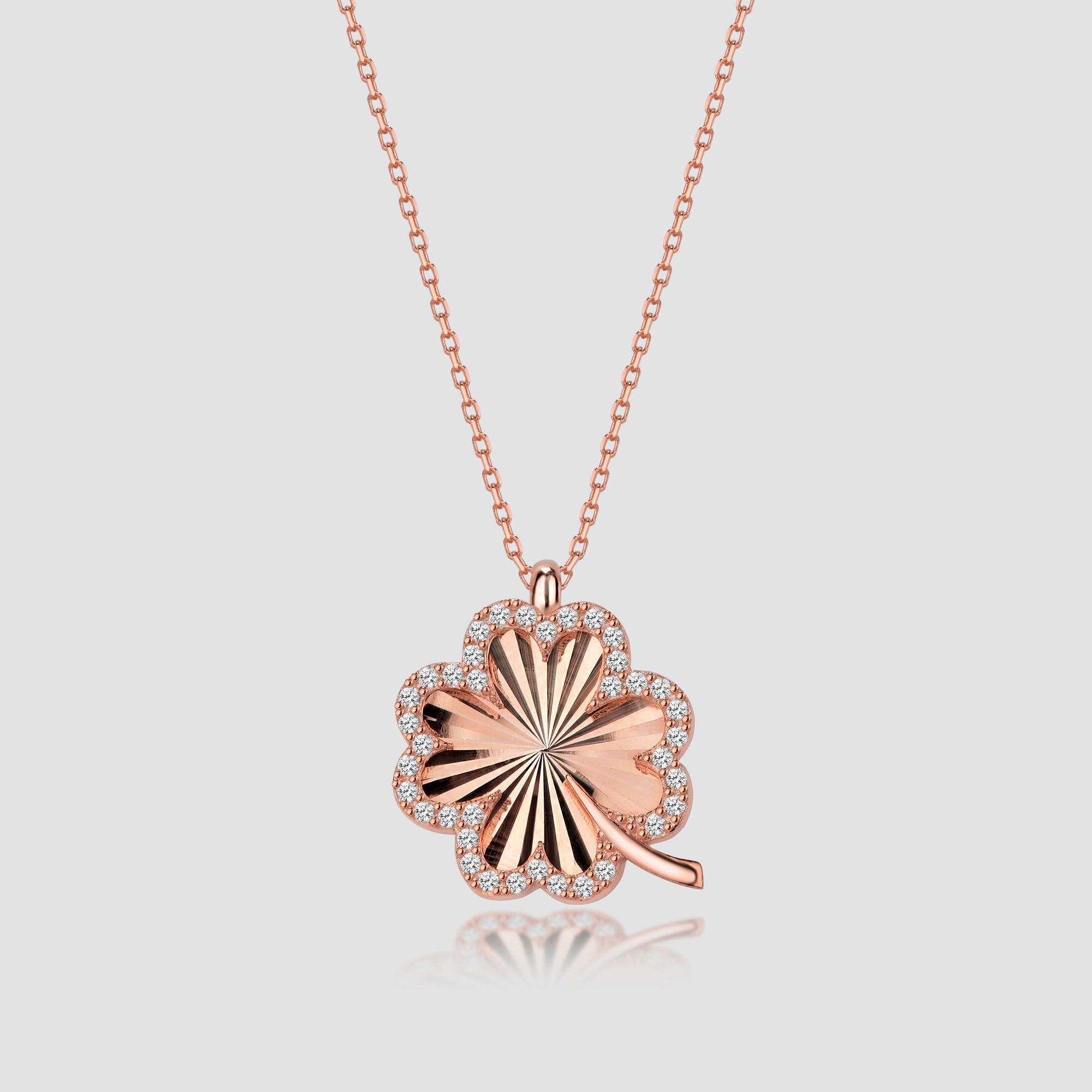 Roséfarbene Kleeblatt Halskette mit Zirkonia, Shiny Collection aus 925 Silber von Dkeniz als eleganter Glücksbringer.