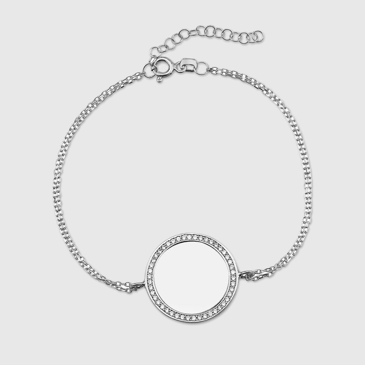 Mirror Gravur Armkette aus 925 Sterling Silber mit rundem Zirkonia-Rahmen auf hellem Hintergrund.