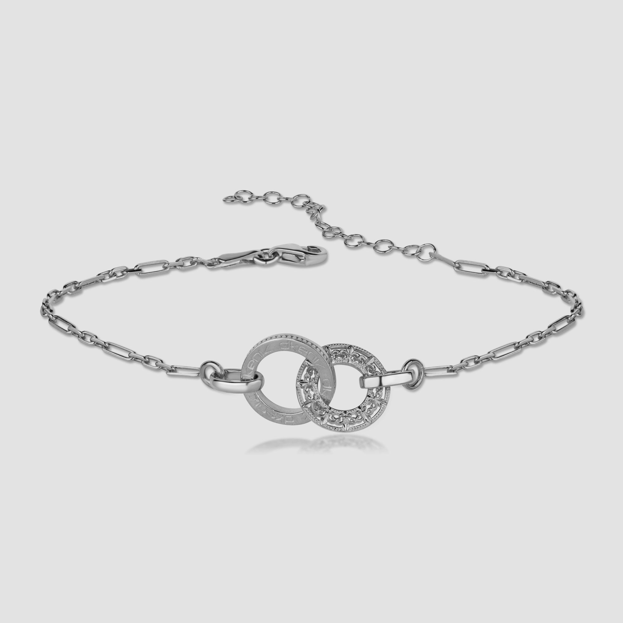 ROYAL RINGS Armkette aus 925 Sterling Silber mit zwei Zirkonia-Ringen auf weißem Hintergrund.