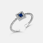 Verstellbarer Saphir Ring Square Shiny Wreath aus 925 Silber mit blauem Stein und Zirkonia.