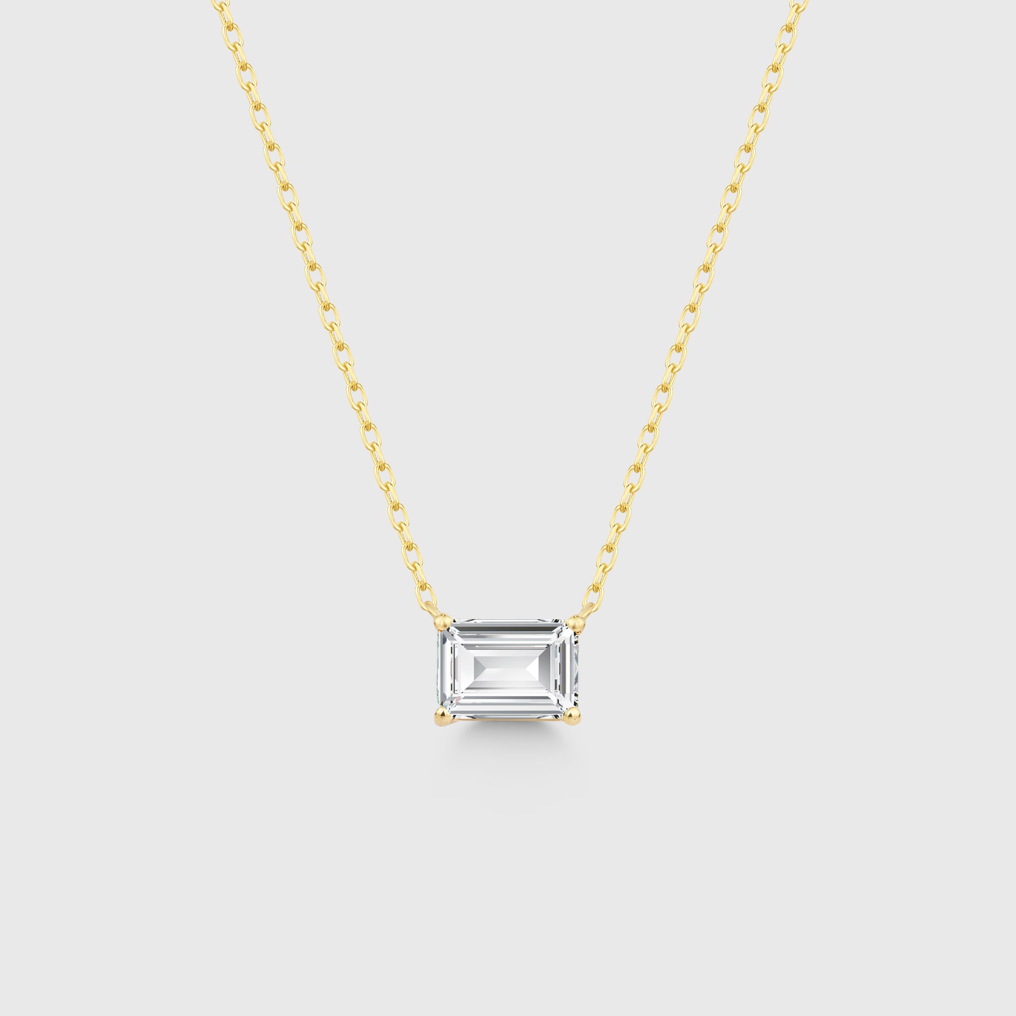Solitär White Emerald Cut Chain in Goldlook: weißer Zirkonia im Smaragdschliff an 14K vergoldeter Kette.