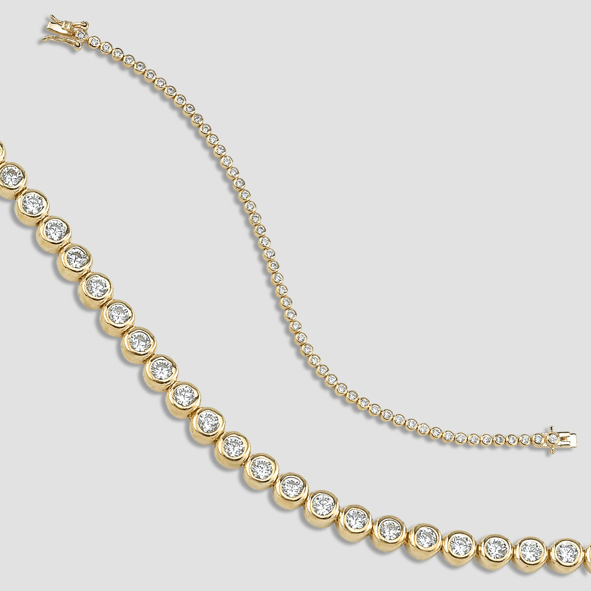 Tennis Armband Gold 14K vergoldet mit weißen Zirkonia – Detailaufnahme mit Kastenschloss.