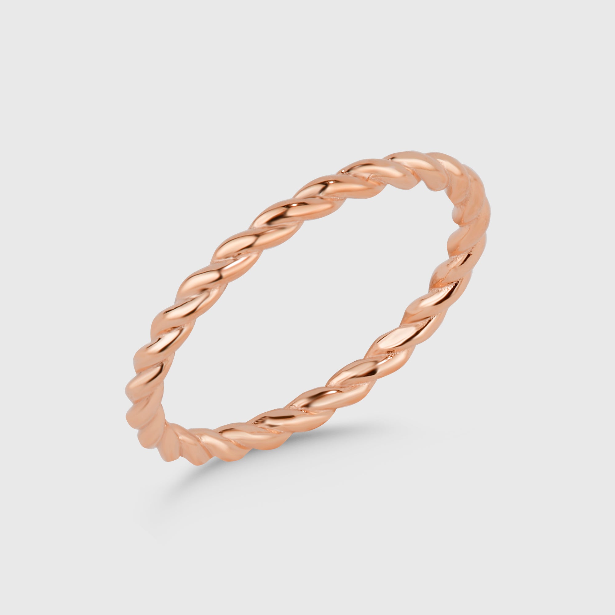 Twist Ring rosévergoldet filigran auf weißem Hintergrund.