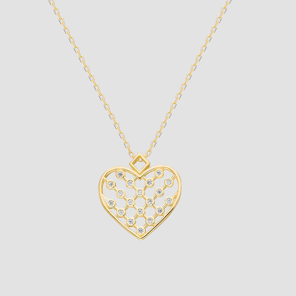 Unique Heart Gold Halskette mit Zirkonia-Herzanhänger aus 925 Silber, Produktfoto auf hellem Hintergrund.